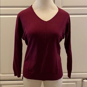 Soft red V-neck sweater